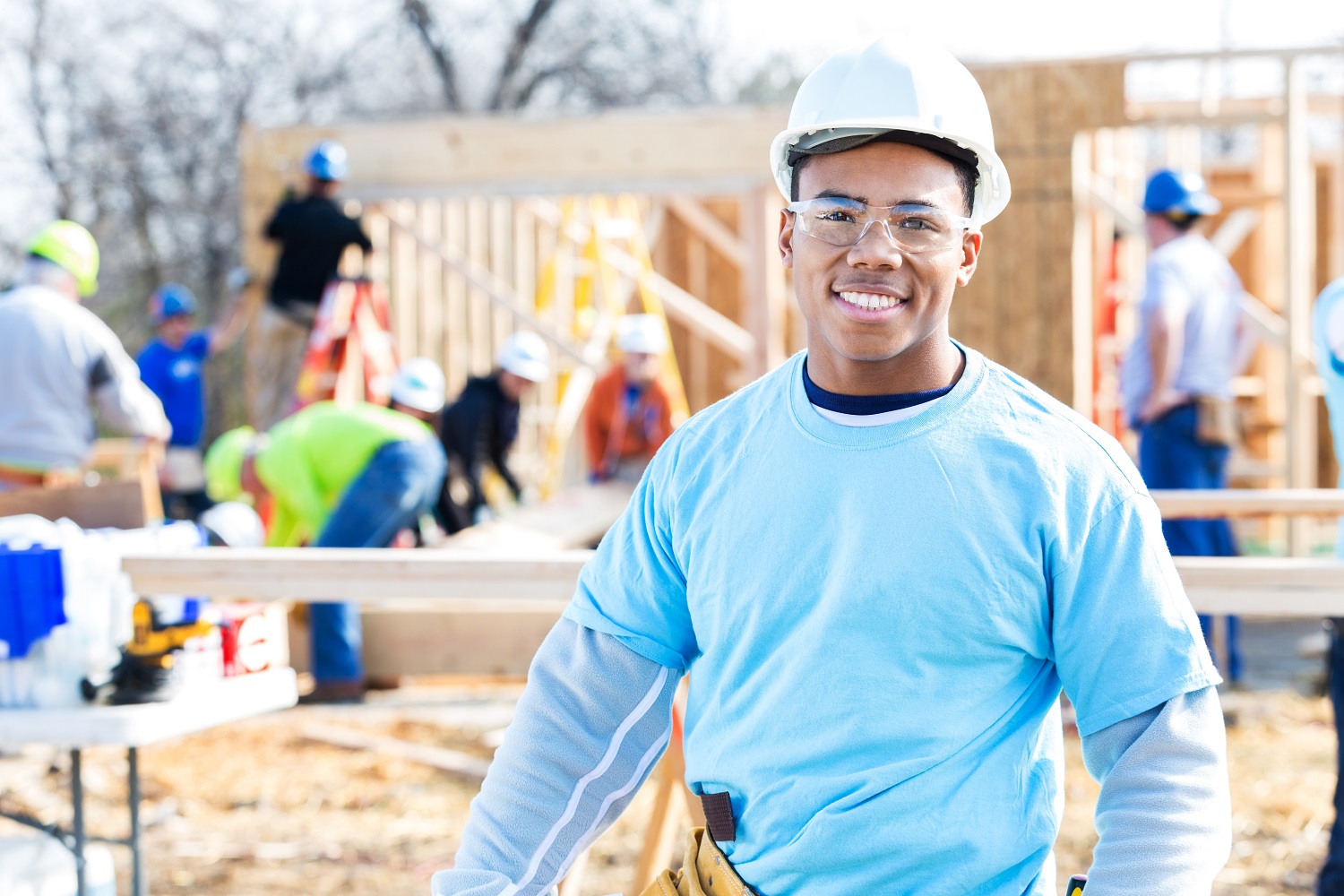 Beazer employee smiling on construction site